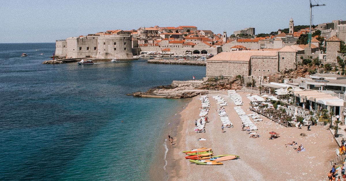 beach in dubrovnik with a view of old town