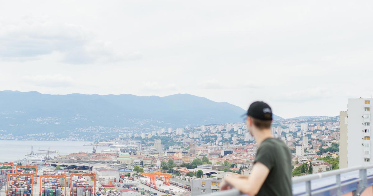 Man standing and looking over Rijeka city
