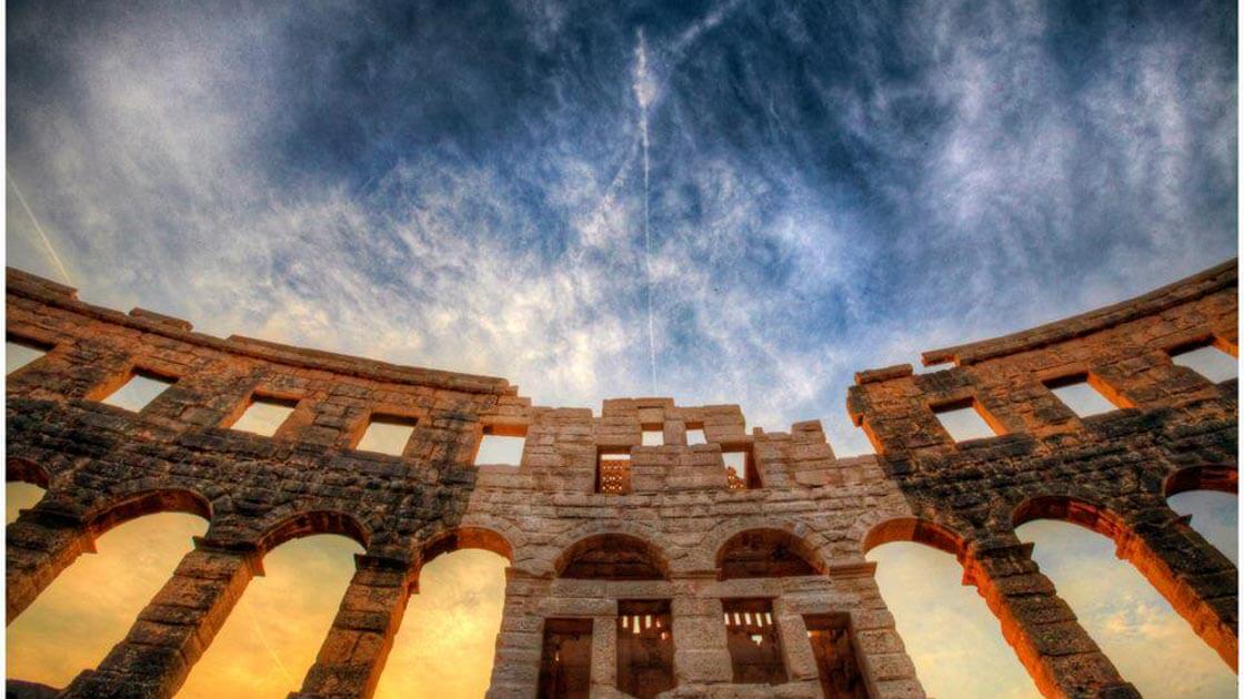 Roman Amphitheater in Pula and blue sky