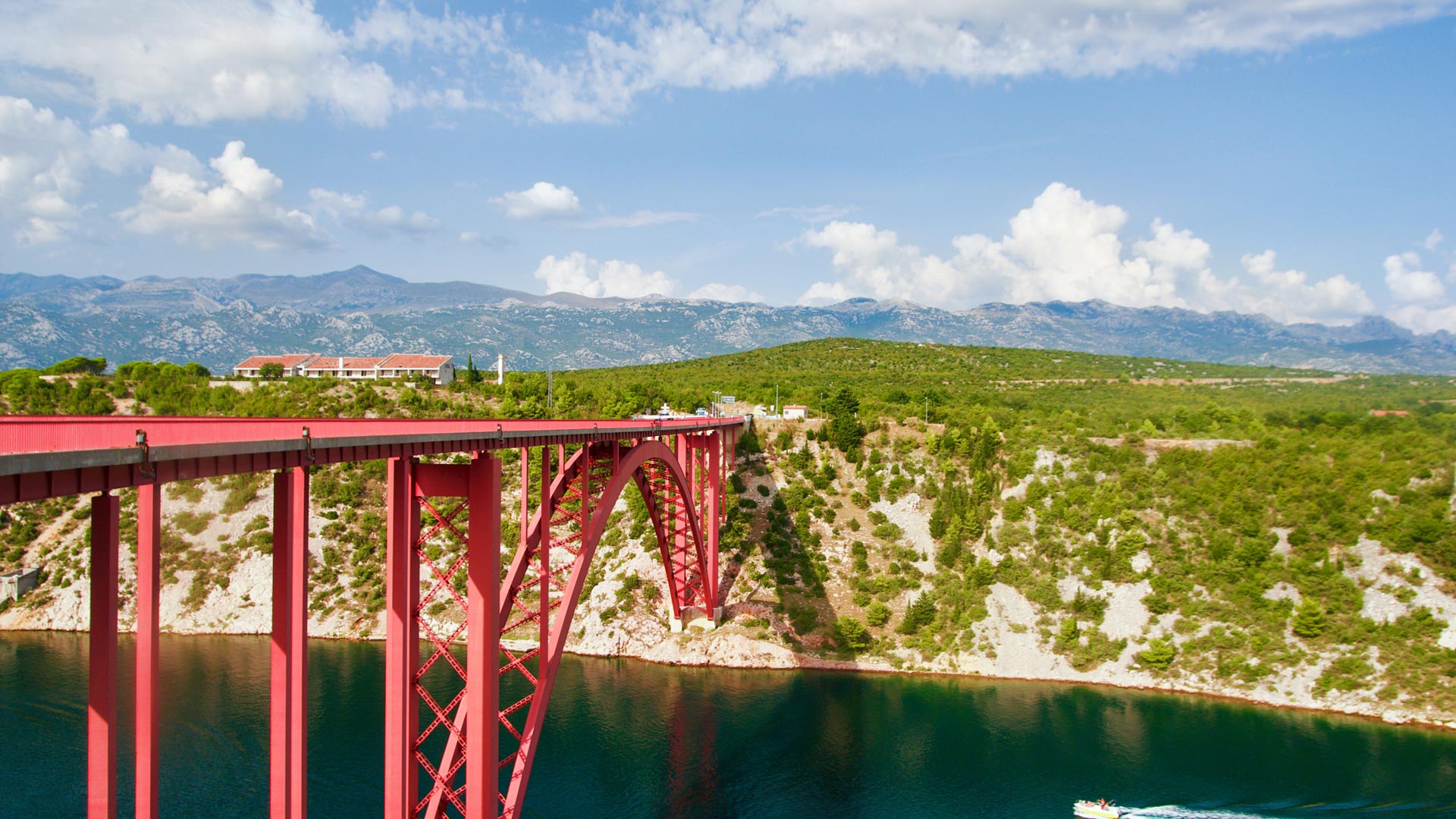 Red bridge over a river in Croatia